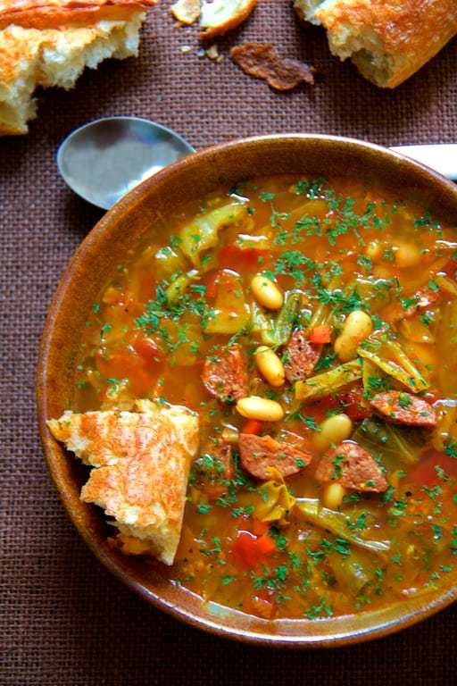 Farmhouse Cabbage Soup with Cannellini Beans and Kielbasa Recipe | HeyFood — heyfoodapp.com