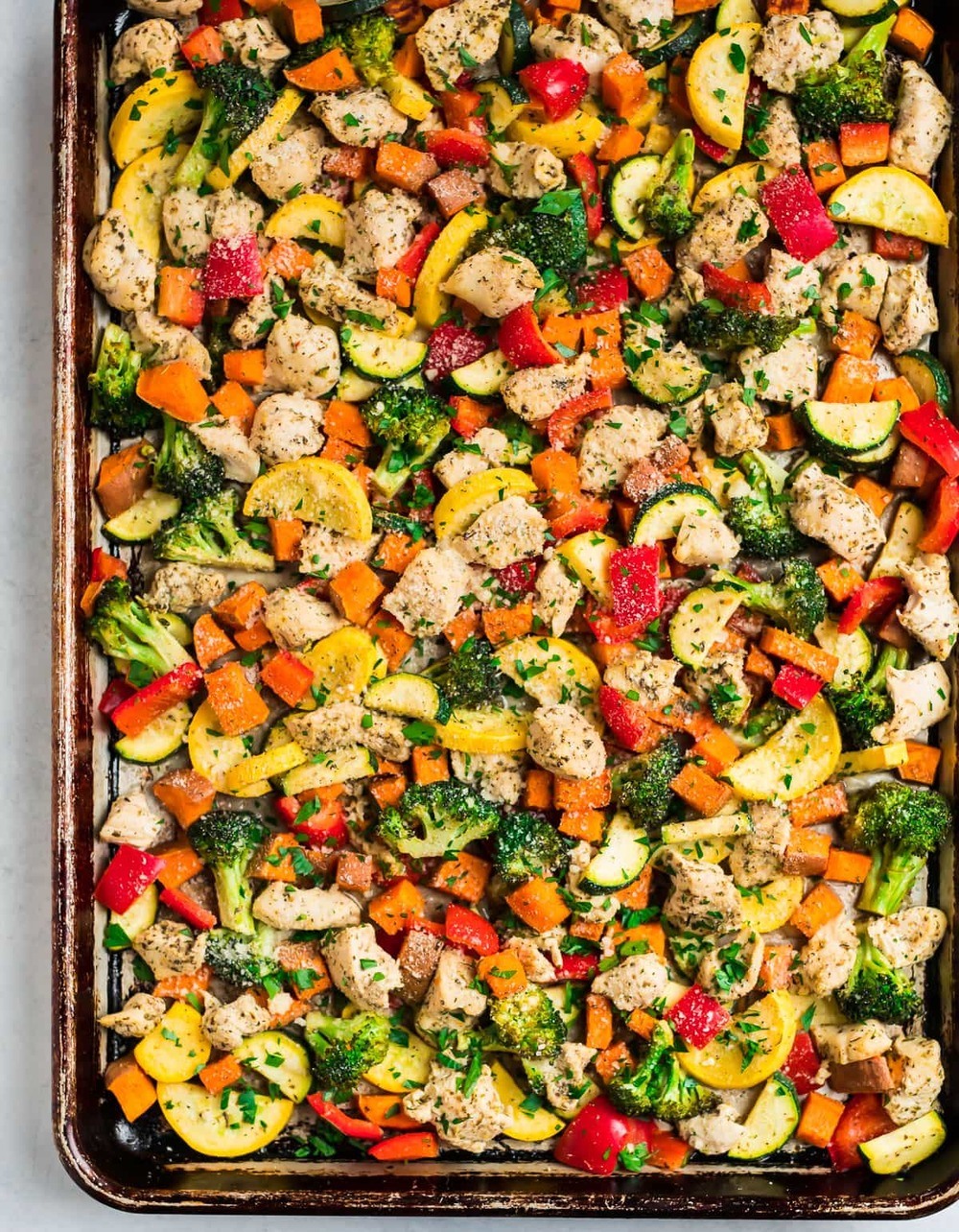 Sheet Pan Chicken and Rainbow Vegetables Recipe | HeyFood — heyfoodapp.com
