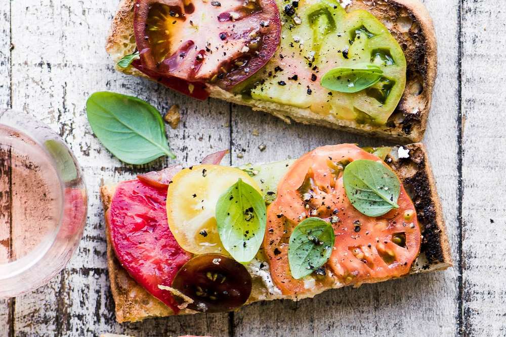 Heirloom Tomato Toast Recipe | HeyFood — heyfoodapp.com