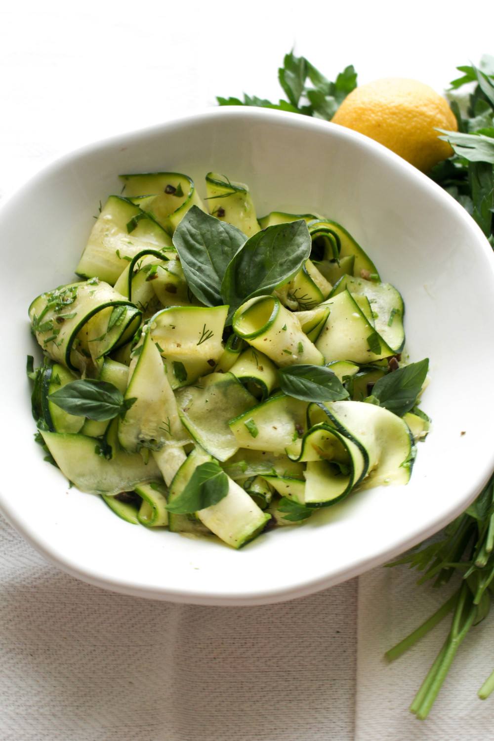 Shaved Zucchini Salad with Olives + Herbs Recipe | HeyFood — heyfoodapp.com