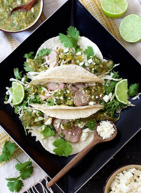 Cumin Lime Roast Pork Tacos with Salsa Verde Recipe | HeyFood — heyfoodapp.com