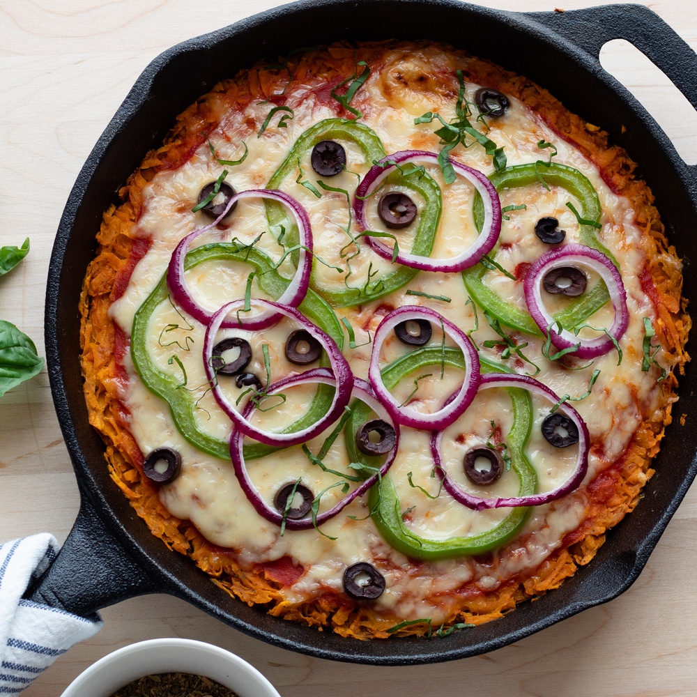 Skillet Sweet Potato Pizza With Olives, Green Peppers & Fresh Basil Recipe | HeyFood — heyfoodapp.com