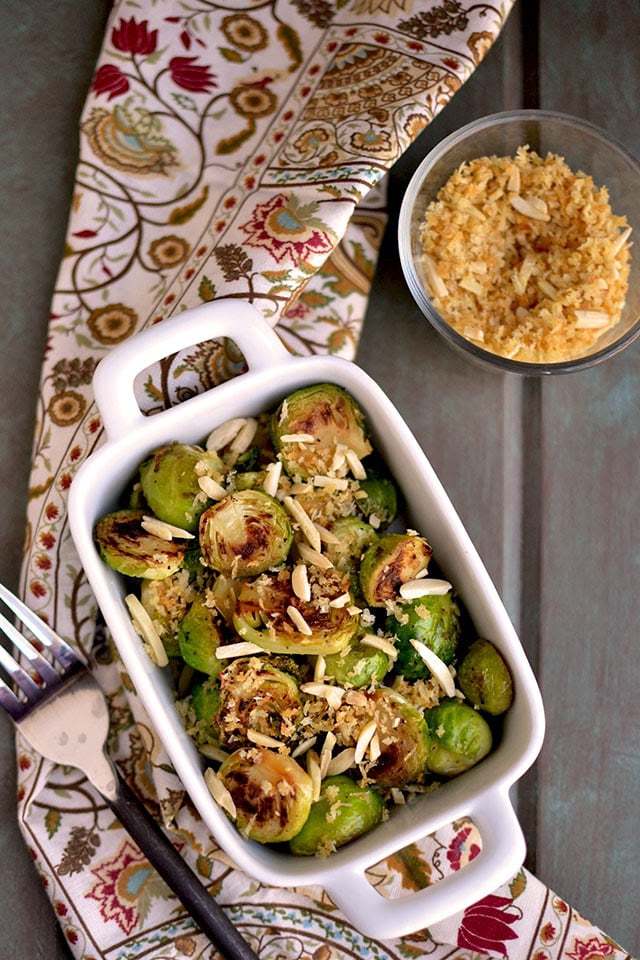 Pan Seared Brussels Sprouts with Toasted Almonds Recipe | HeyFood — heyfoodapp.com