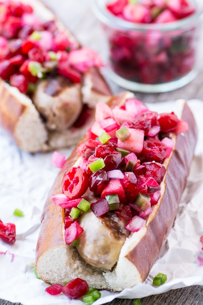 Brats with Spicy Cranberry Relish Recipe | HeyFood — heyfoodapp.com