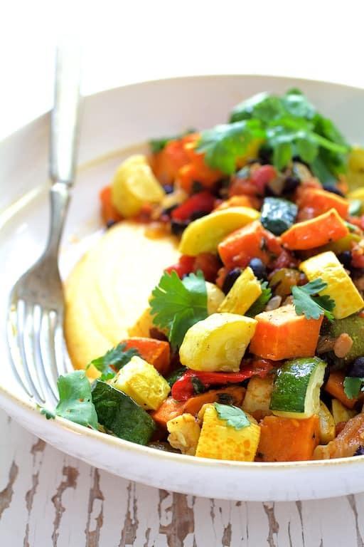 Spicy Roasted Vegetable Ragout with Black Beans and Polenta Recipe | HeyFood — heyfoodapp.com