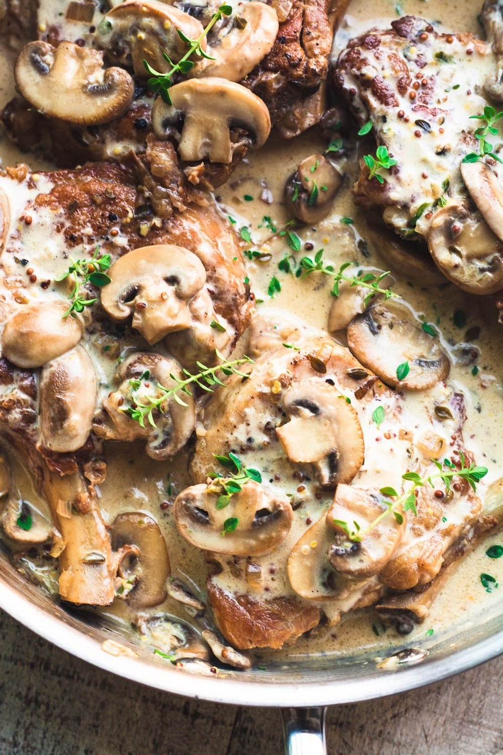 Instant Pot Pork Chops in Creamy Mushroom Sauce Recipe | HeyFood — heyfoodapp.com