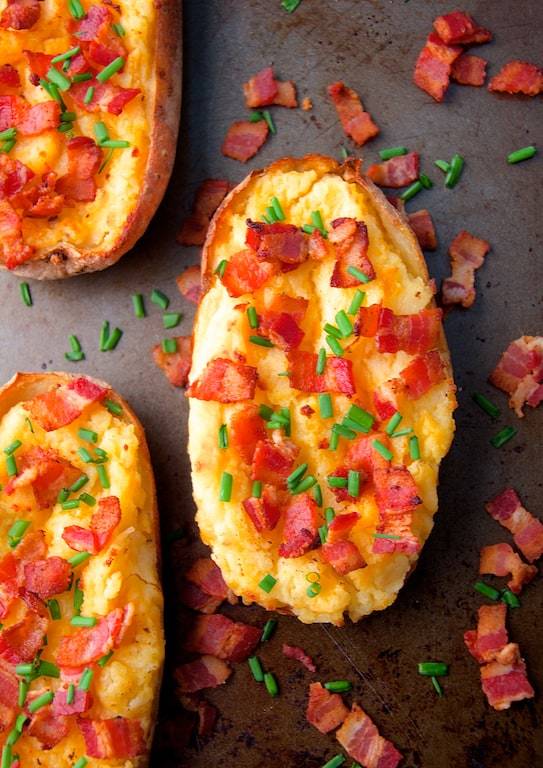 Perfect Cheddar and Bacon Twice-Baked Potatoes Recipe | HeyFood — heyfoodapp.com
