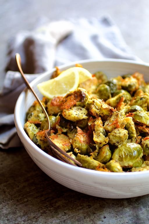 Lemon Parmesan Crusted Brussels Sprouts Recipe | HeyFood — heyfoodapp.com