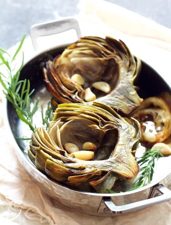 Oven Roasted Artichokes with Roasted Garlic Butter Recipe | HeyFood — heyfoodapp.com