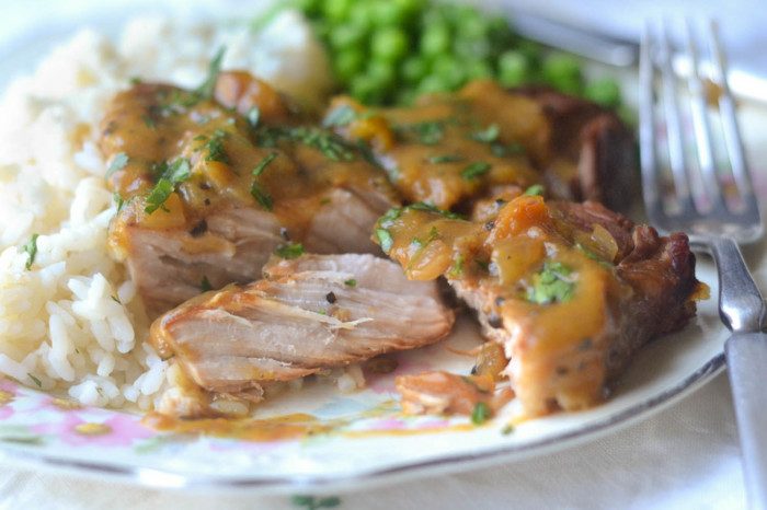 Peach Barbecue Smothered Pork Chops Recipe | HeyFood — heyfoodapp.com