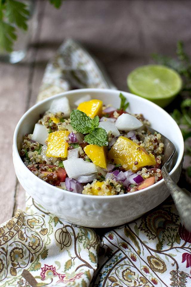 Quinoa Mango Salad for #Food of the World Recipe | HeyFood — heyfoodapp.com