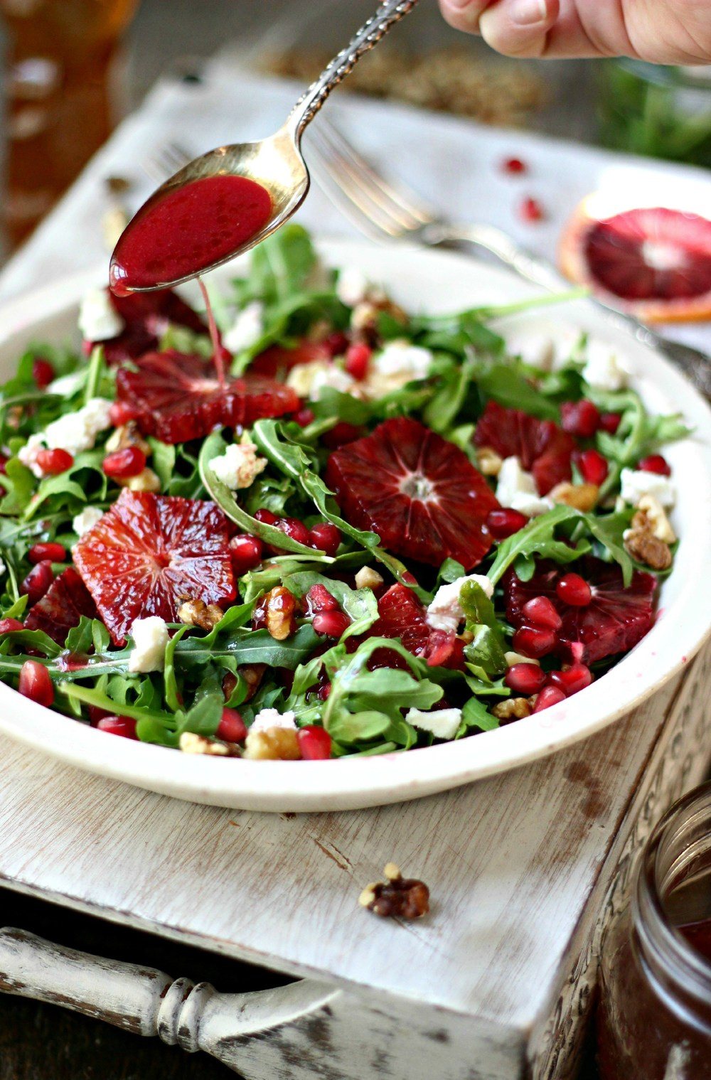 Arugula, Blood Orange and Honey Goat Cheese Salad with Pomegranate Vinaigrette Recipe | HeyFood — heyfoodapp.com