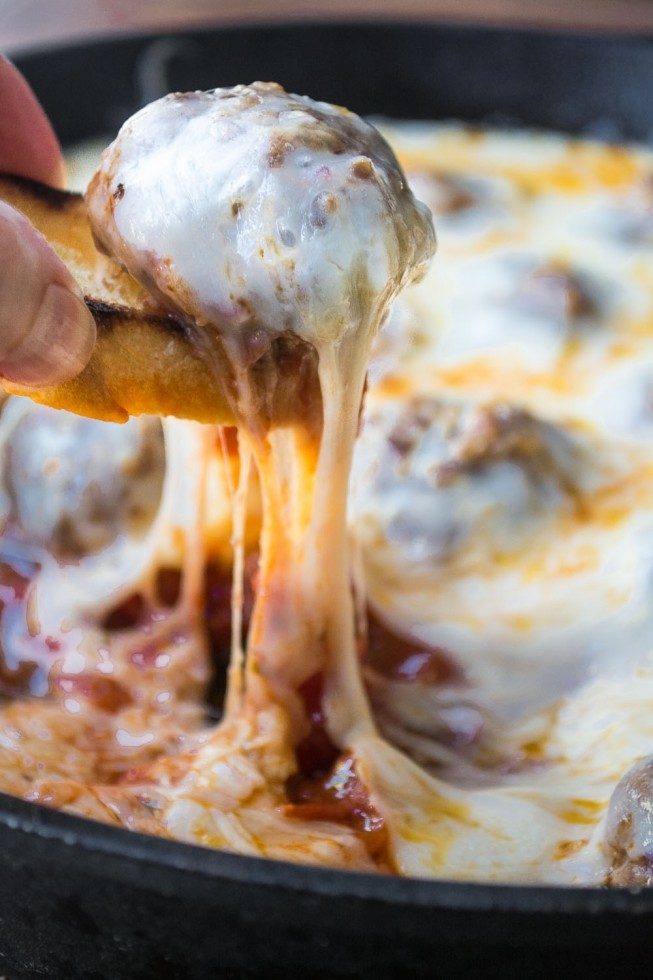 Cheesy Skillet Meatballs with Garlic Toast Recipe | HeyFood — heyfoodapp.com