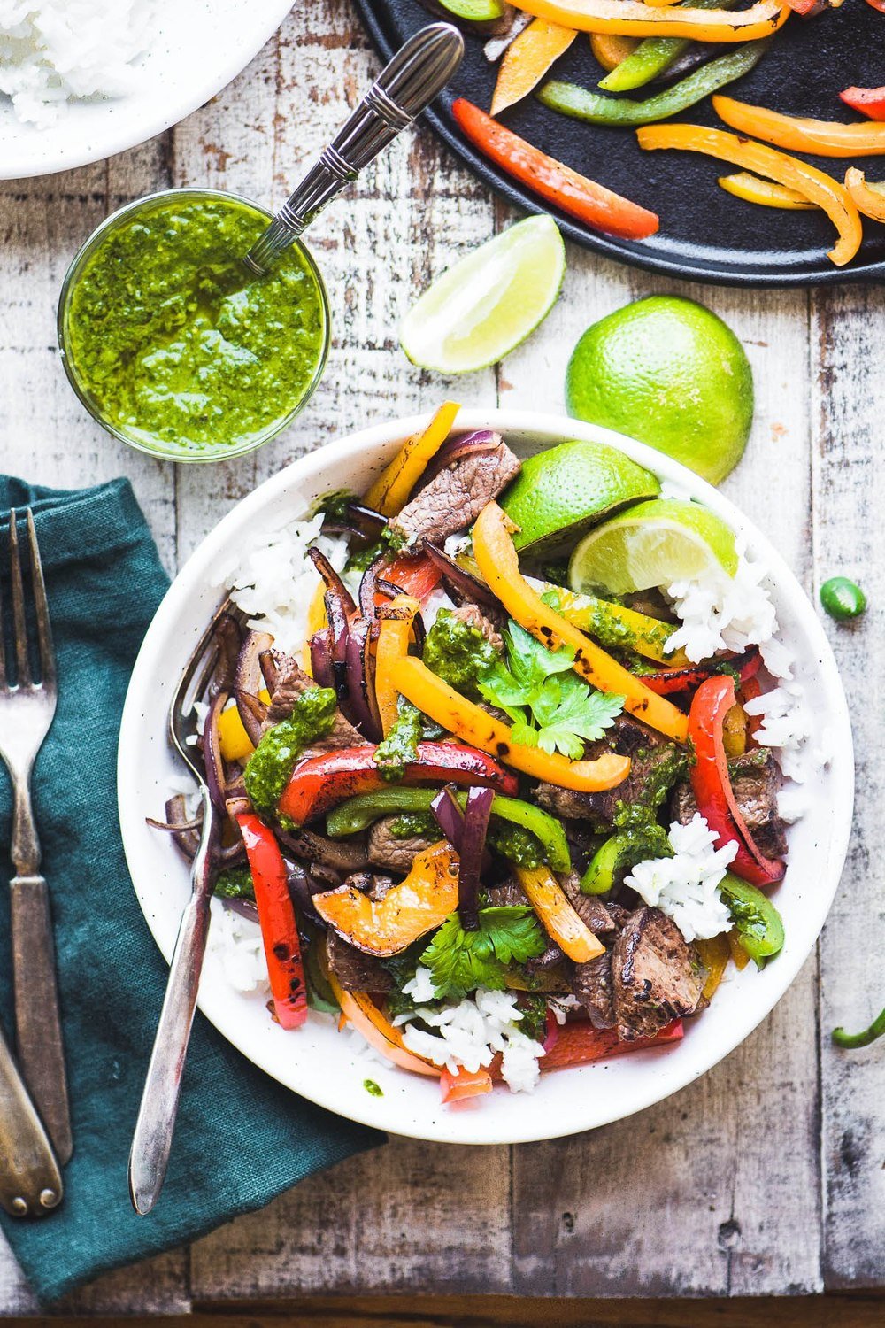 Steak Fajita Bowls with Chimichurri Sauce Recipe | HeyFood — heyfoodapp.com