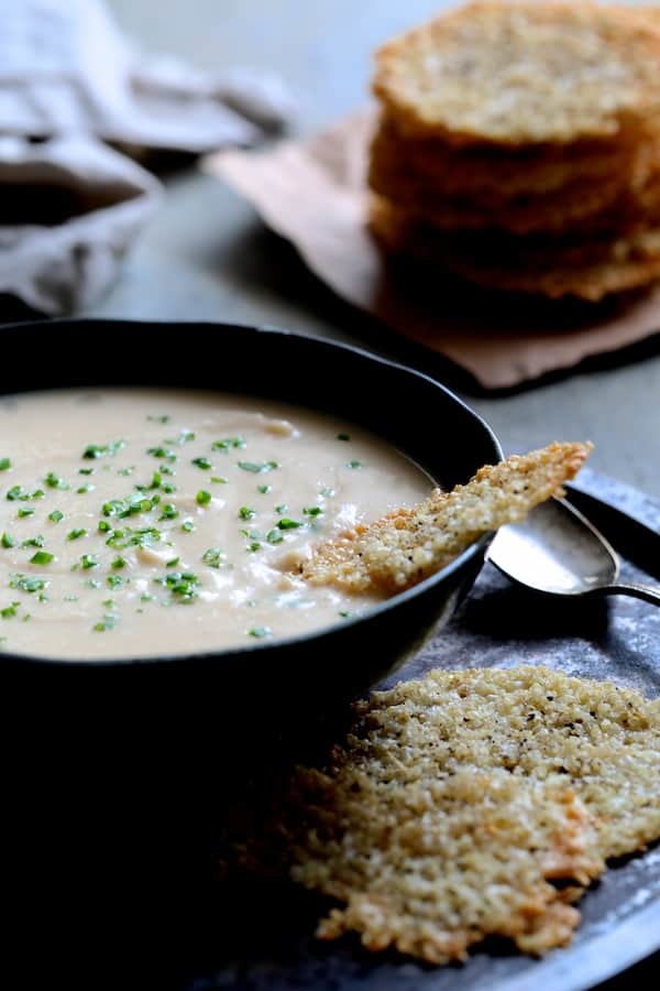 Creamy White Bean Rutabaga and Roasted Garlic Soup with Quinoa Parmesan Crisps Recipe | HeyFood — heyfoodapp.com