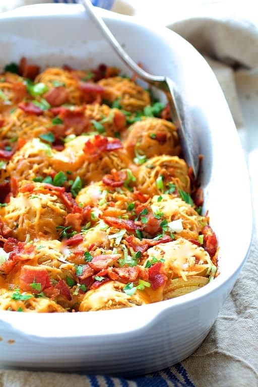 Baby Hasselback Potato Bake with Cheddar and Bacon Recipe | HeyFood — heyfoodapp.com