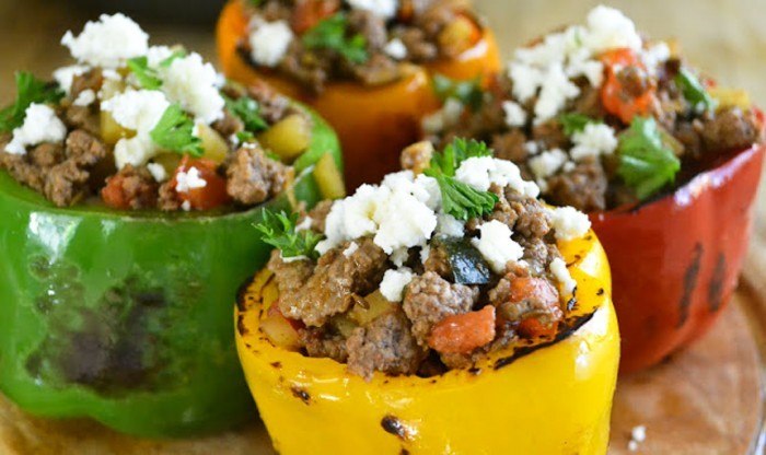 Stuffed Bell Peppers with Picadillo Recipe | HeyFood — heyfoodapp.com