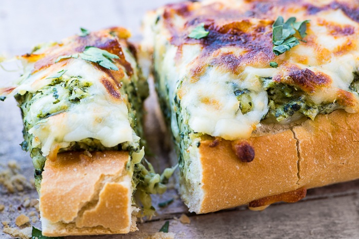 Cheesy Spinach Artichoke Bread Recipe | HeyFood — heyfoodapp.com