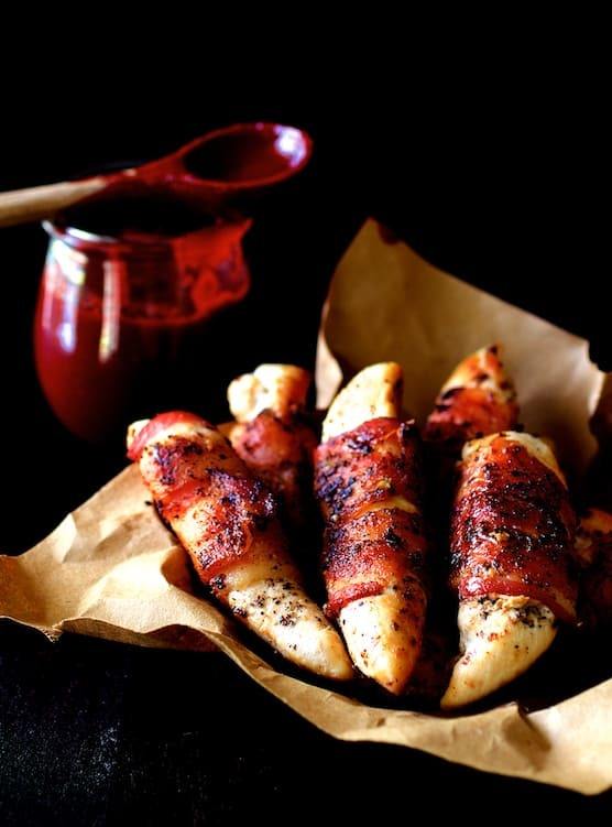 Bacon Wrapped Chicken Tenders with Raspberry Chipotle Sauce Recipe | HeyFood — heyfoodapp.com