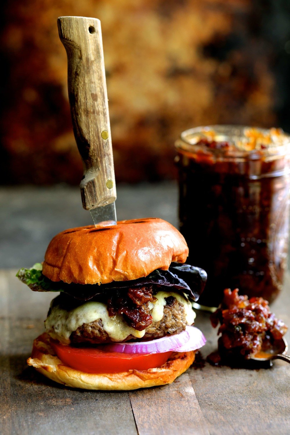 Grilled Burgers with Bacon Tomato Jam and Smoked Gouda Recipe | HeyFood — heyfoodapp.com