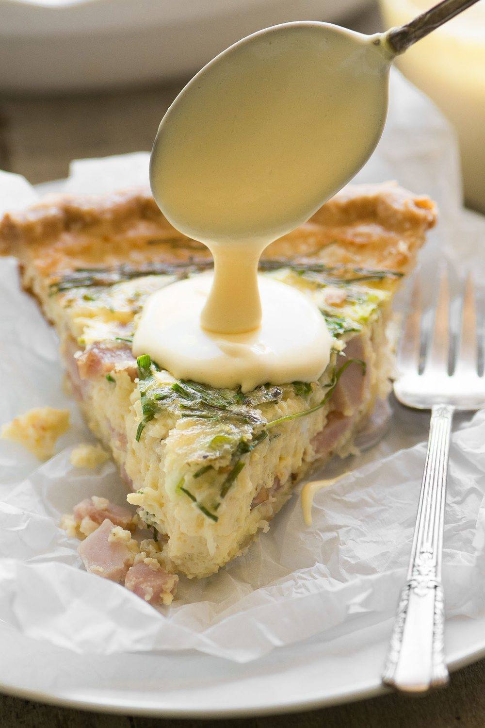 Eggs Benedict Quiche with Hollandaise Sauce Recipe | HeyFood — heyfoodapp.com