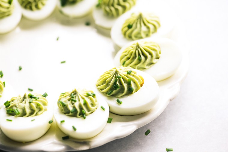 Guacamole Deviled Eggs Recipe | HeyFood — heyfoodapp.com