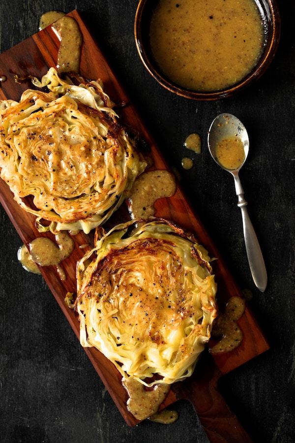 Roasted Cabbage Steaks with Mustard Vinaigrette Recipe | HeyFood — heyfoodapp.com