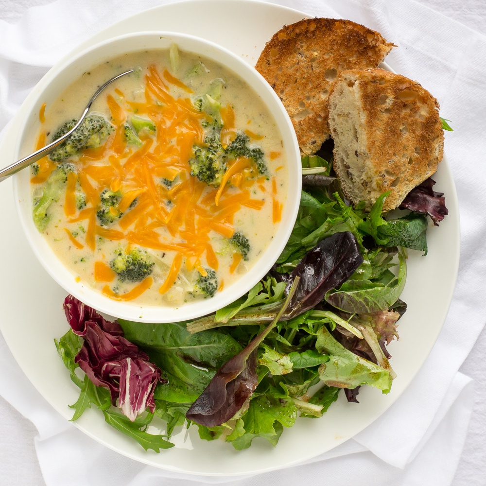 Broccoli Cheddar Soup With Toast & Mixed Greens Salad Recipe | HeyFood — heyfoodapp.com