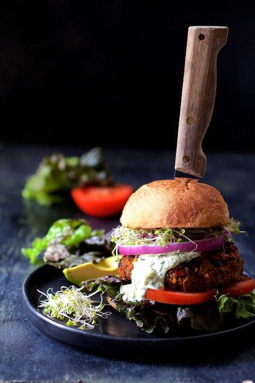 Lentil Walnut Veggie Burgers with Avocado Tzatziki Sauce Recipe | HeyFood — heyfoodapp.com