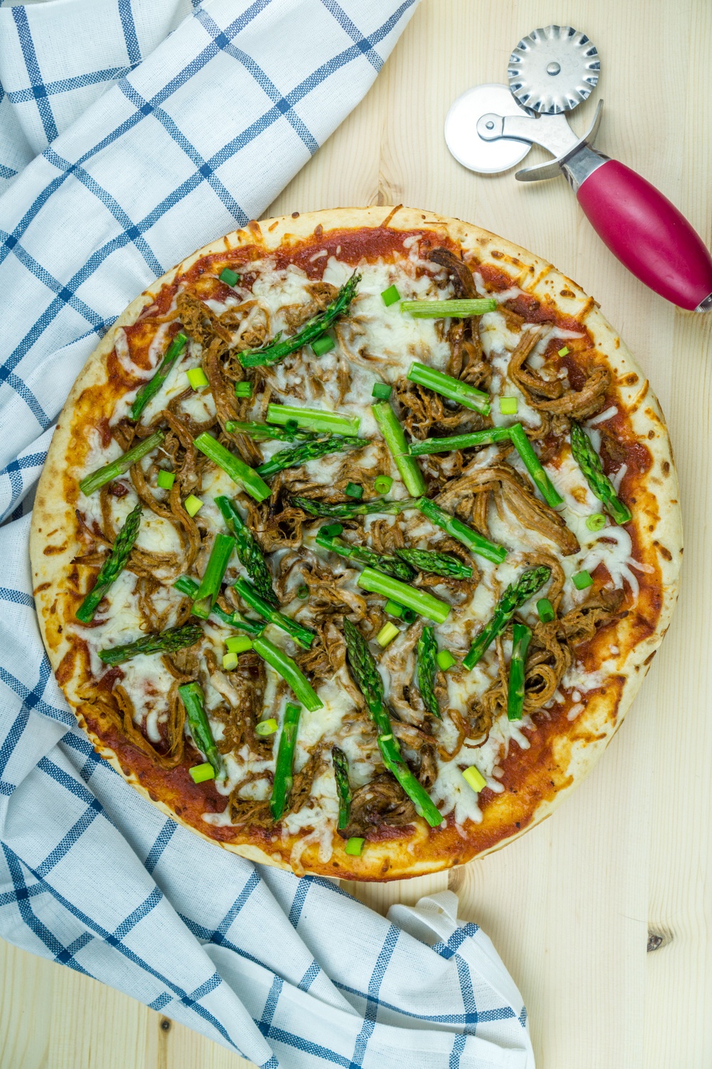 BBQ Pulled Pork Pizza with Asparagus Recipe | HeyFood — heyfoodapp.com