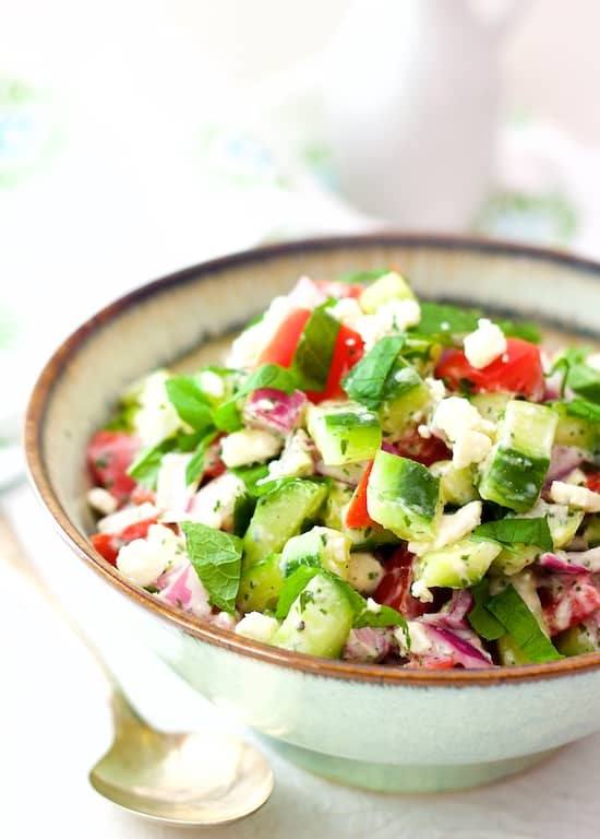 Cucumber, Tomato and Red Onion Salad with Yogurt - Mint Dressing and Feta Cheese Recipe | HeyFood — heyfoodapp.com