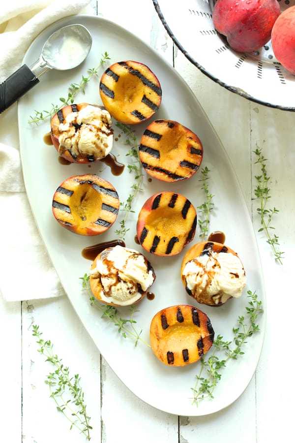 Grilled Peaches with Vanilla Ice Cream and Honey Balsamic Drizzle Recipe | HeyFood — heyfoodapp.com