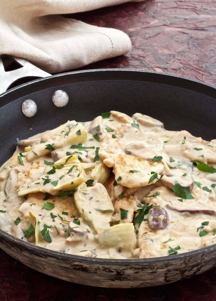 Turkey Scallopine in Sherry Cream Sauce with Wild Mushrooms and Artichoke Hearts Recipe | HeyFood — heyfoodapp.com