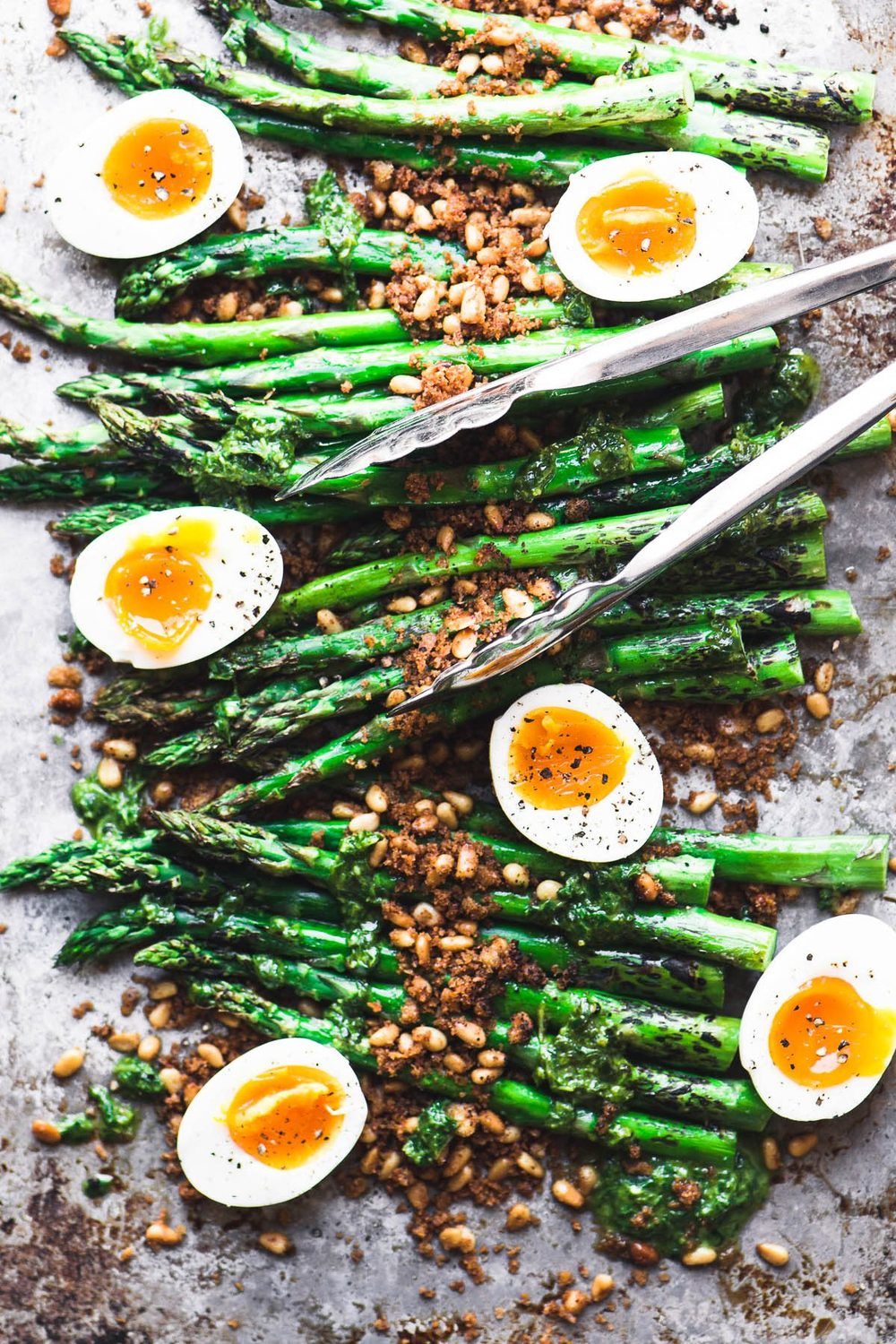 Roasted Asparagus with Crispy Breadcrumbs, Pine Nuts and Runny Eggs Recipe | HeyFood — heyfoodapp.com