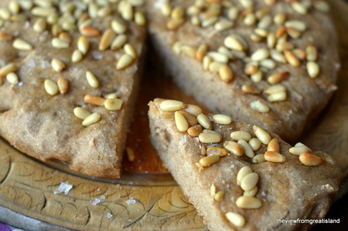 Whole Wheat Skillet Focaccia with Pine Nuts Recipe | HeyFood — heyfoodapp.com