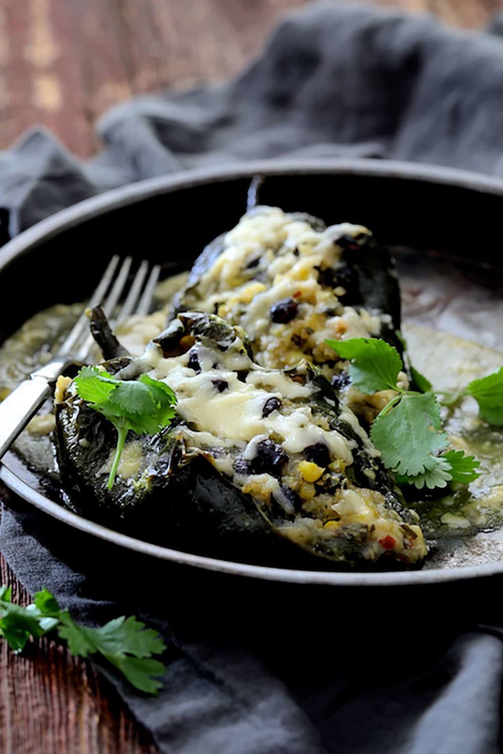 Quinoa Corn and Black Bean Stuffed Poblanos Recipe | HeyFood — heyfoodapp.com